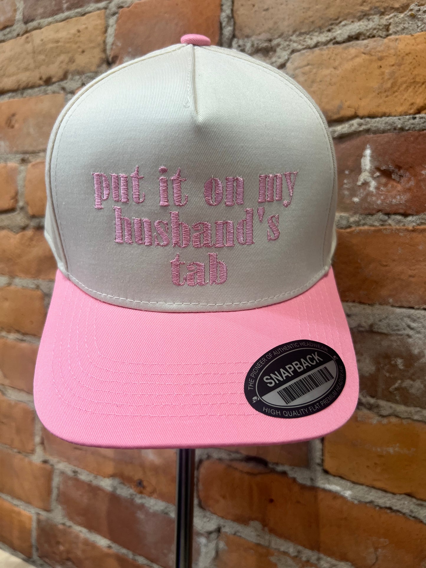 put it on my husband's tab hats