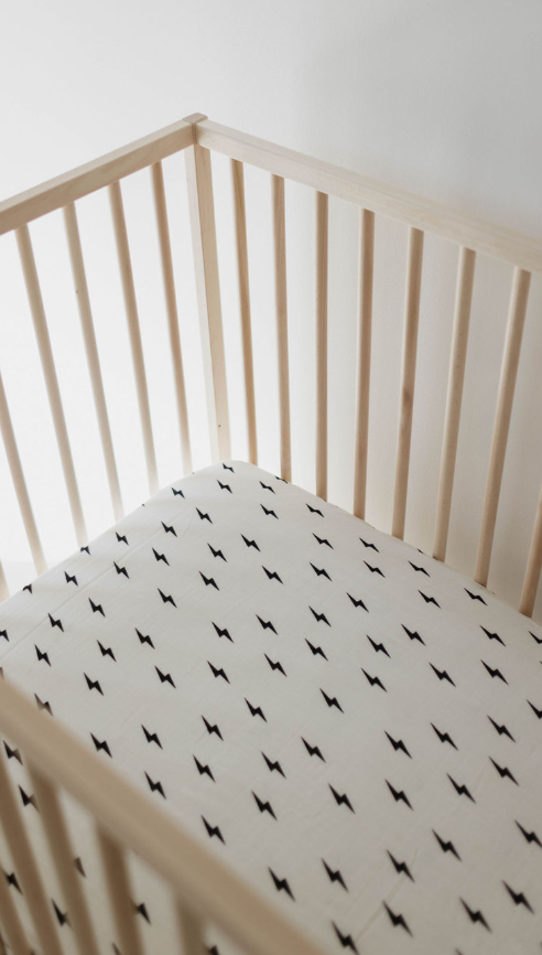 muslin crib sheet | white + black lightning bolt