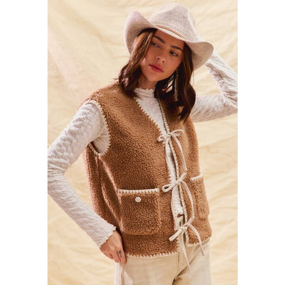 sherpa vest with stitch detail + front pockets