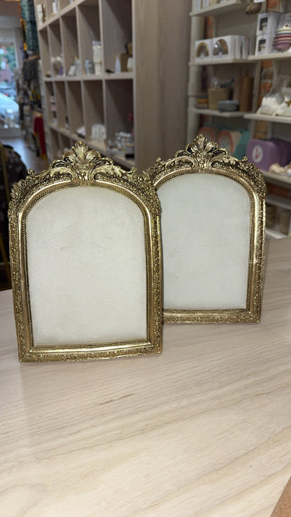 arched gold jewelry display frame