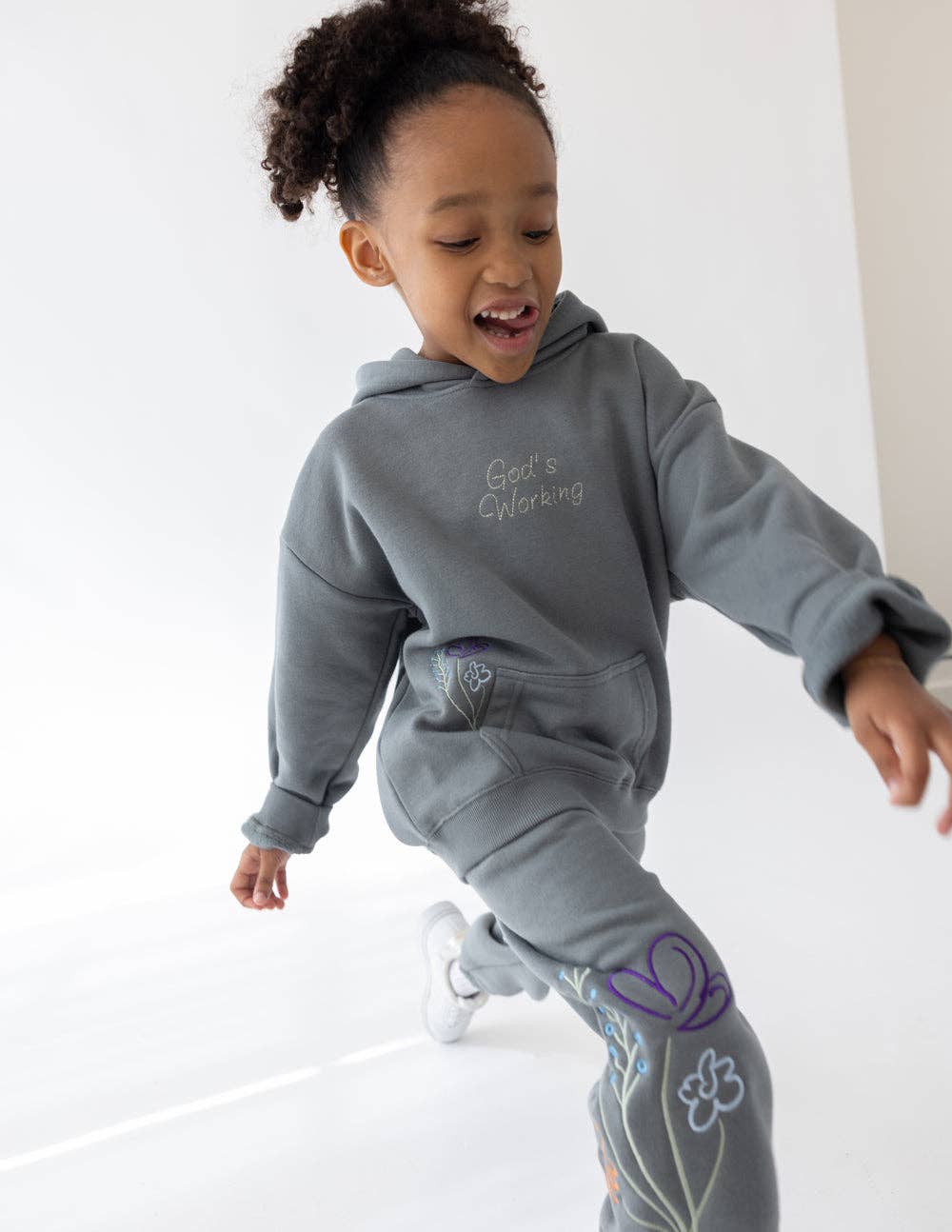 god's still working kids hoodie