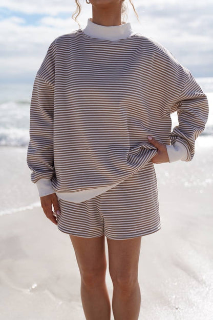 brown + white big striped mockneck sweatshirt