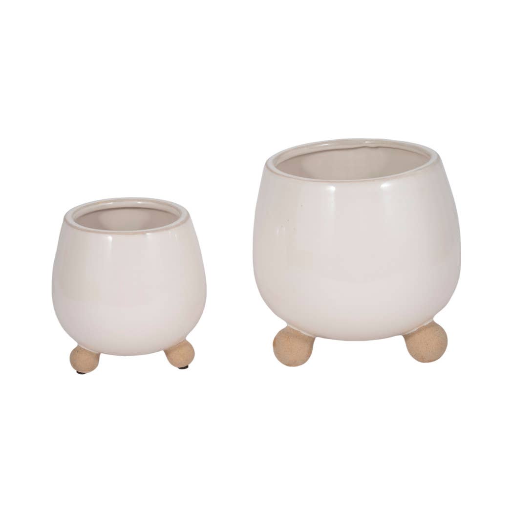 ivory round planter with knobby feet