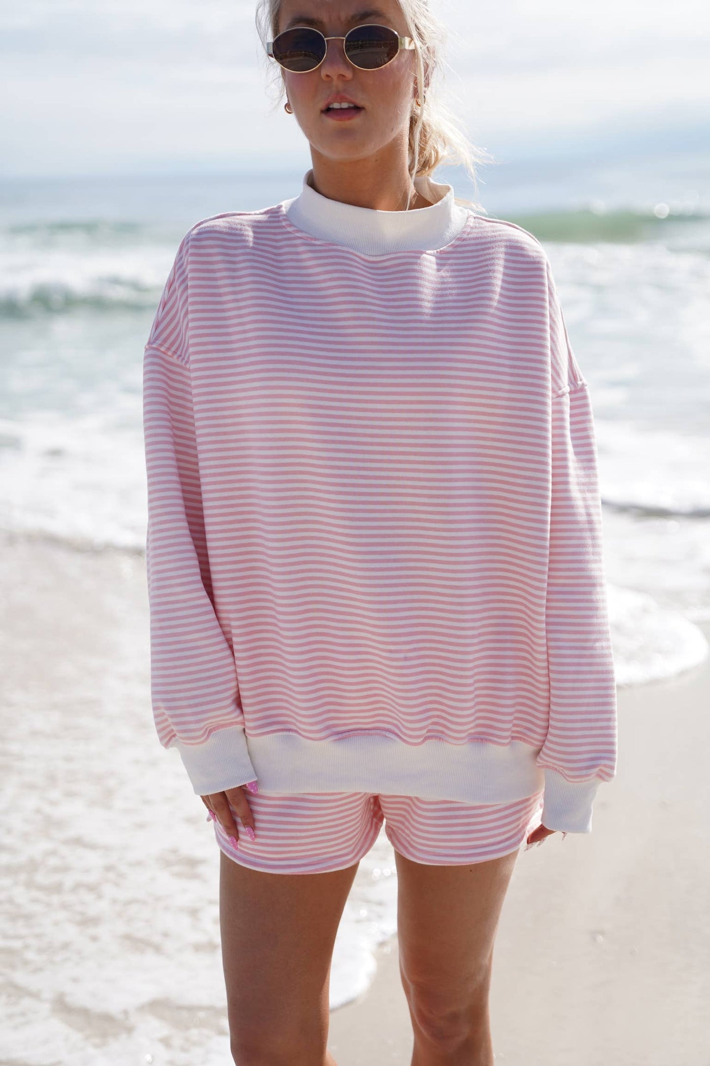 light pink + white big striped mockneck sweatshirt
