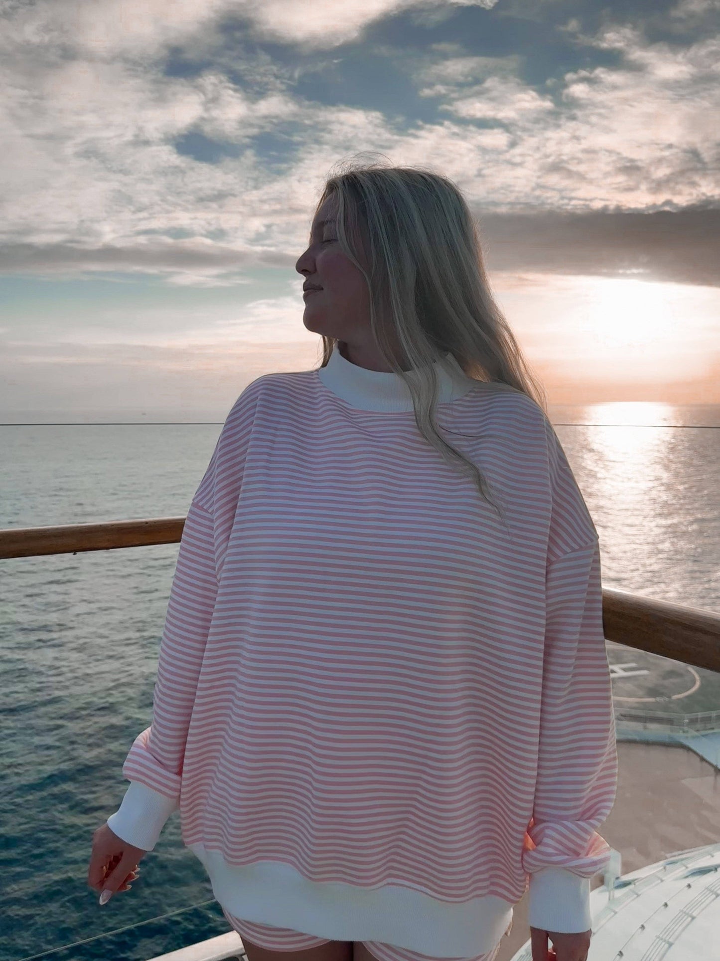light pink + white big striped mockneck sweatshirt