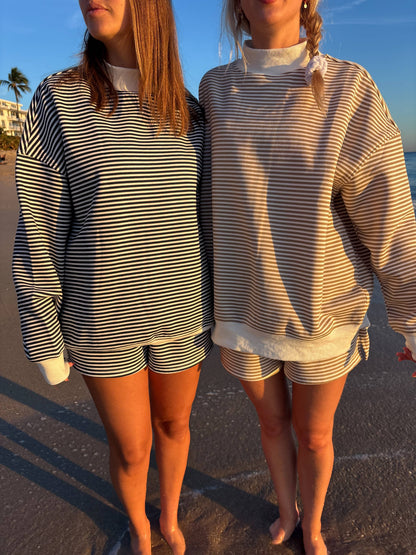 brown + white big striped mockneck sweatshirt