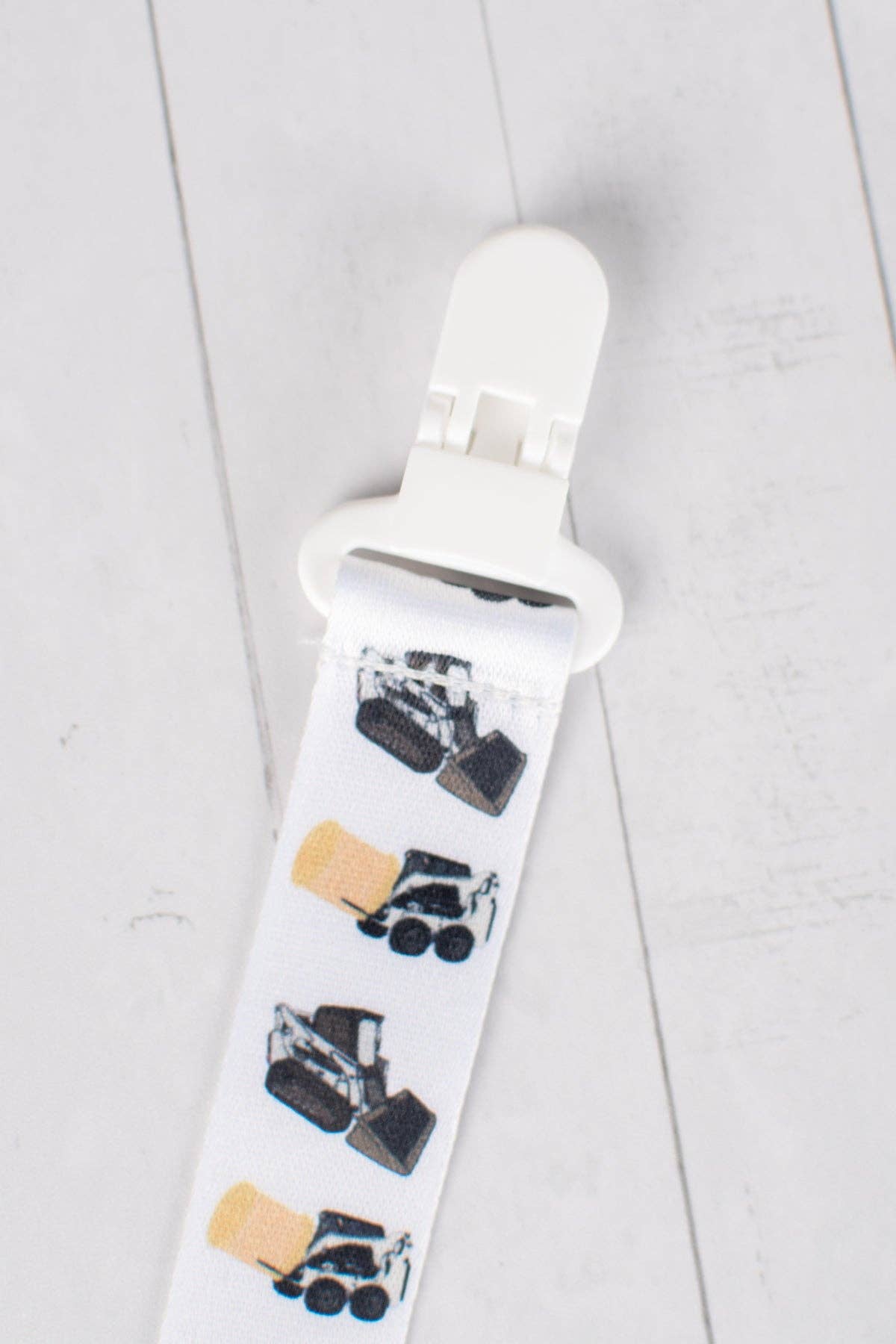 skid loader paci clip