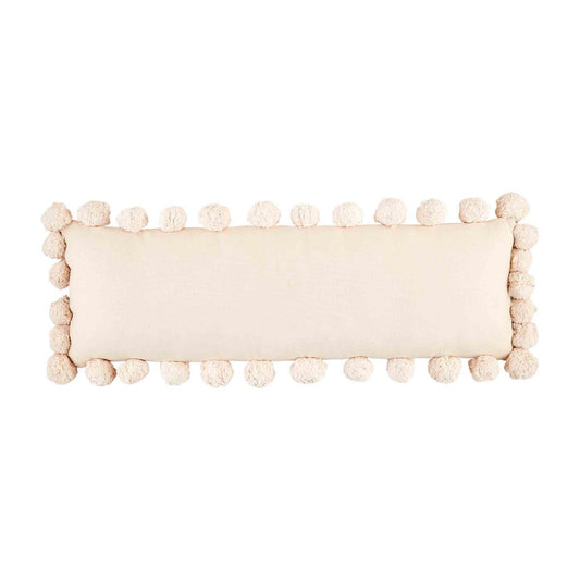 cream pom-pom pillow