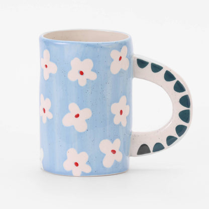 handmade blue daisy ceramic coffee mug