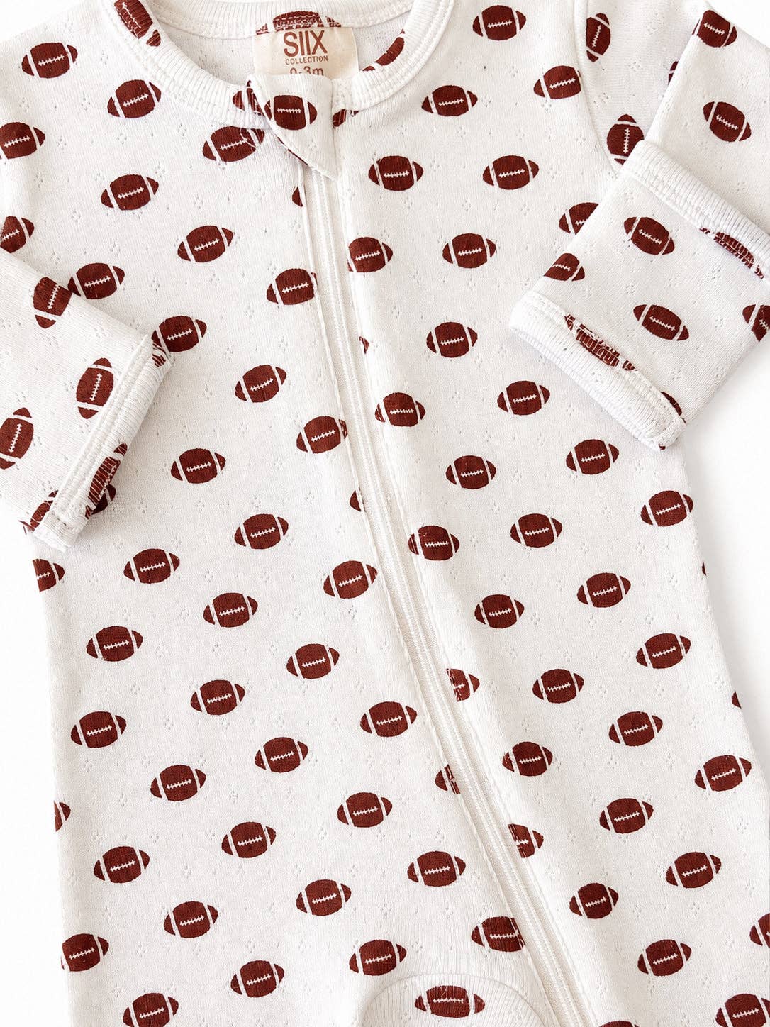 football / organic pointelle 2-way zip footie