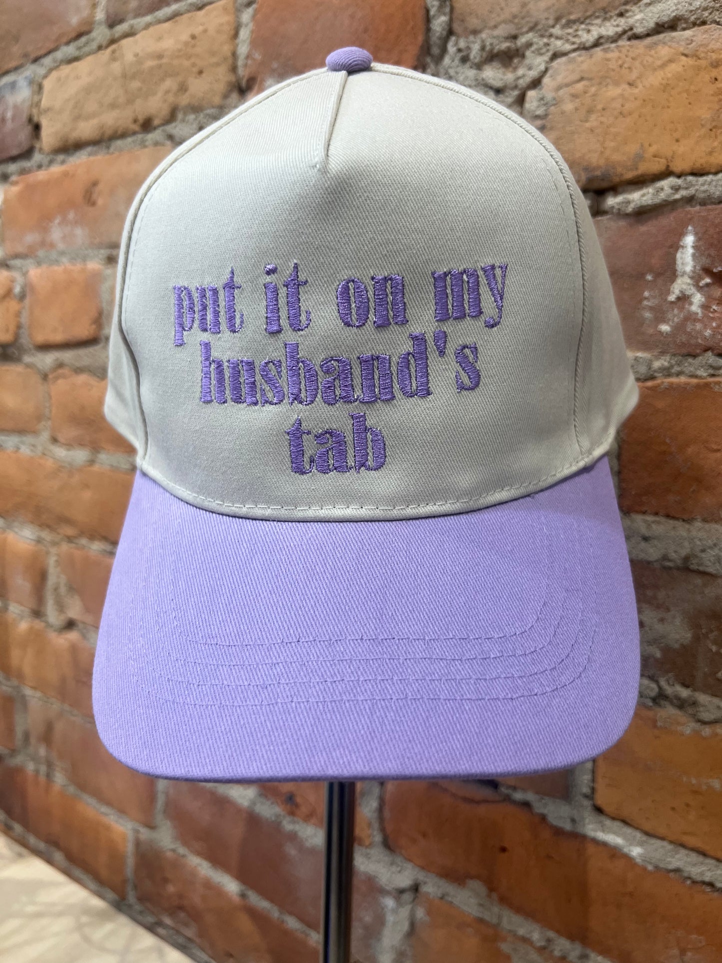 put it on my husband's tab hats