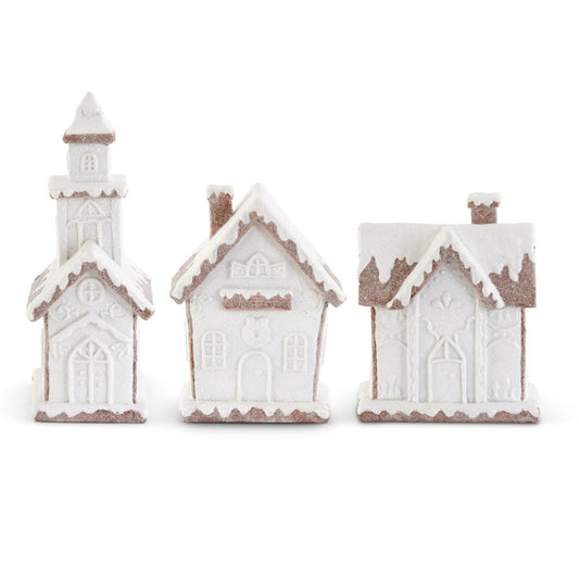 glittered white frosted gingerbread house