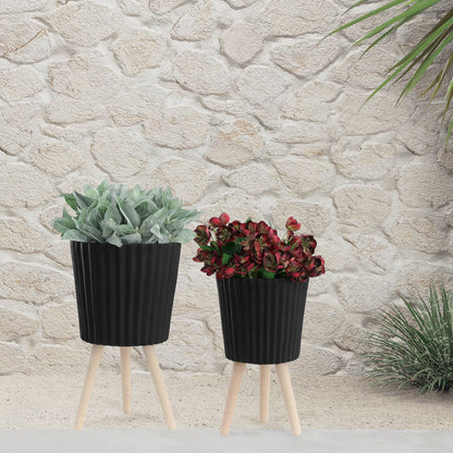 black resin w/ wood legs planter