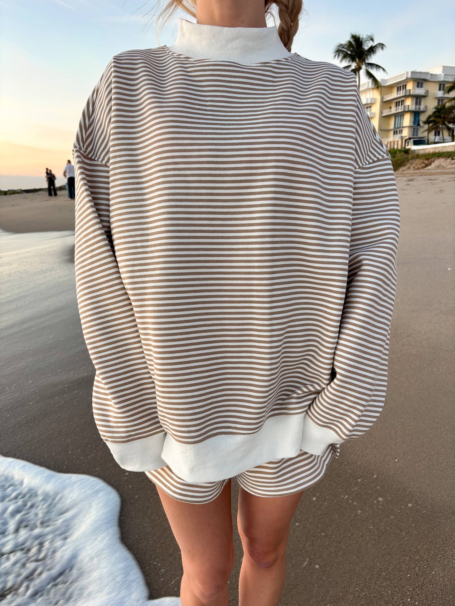 brown + white big striped mockneck sweatshirt