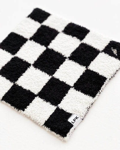 checkered plush lovey | black