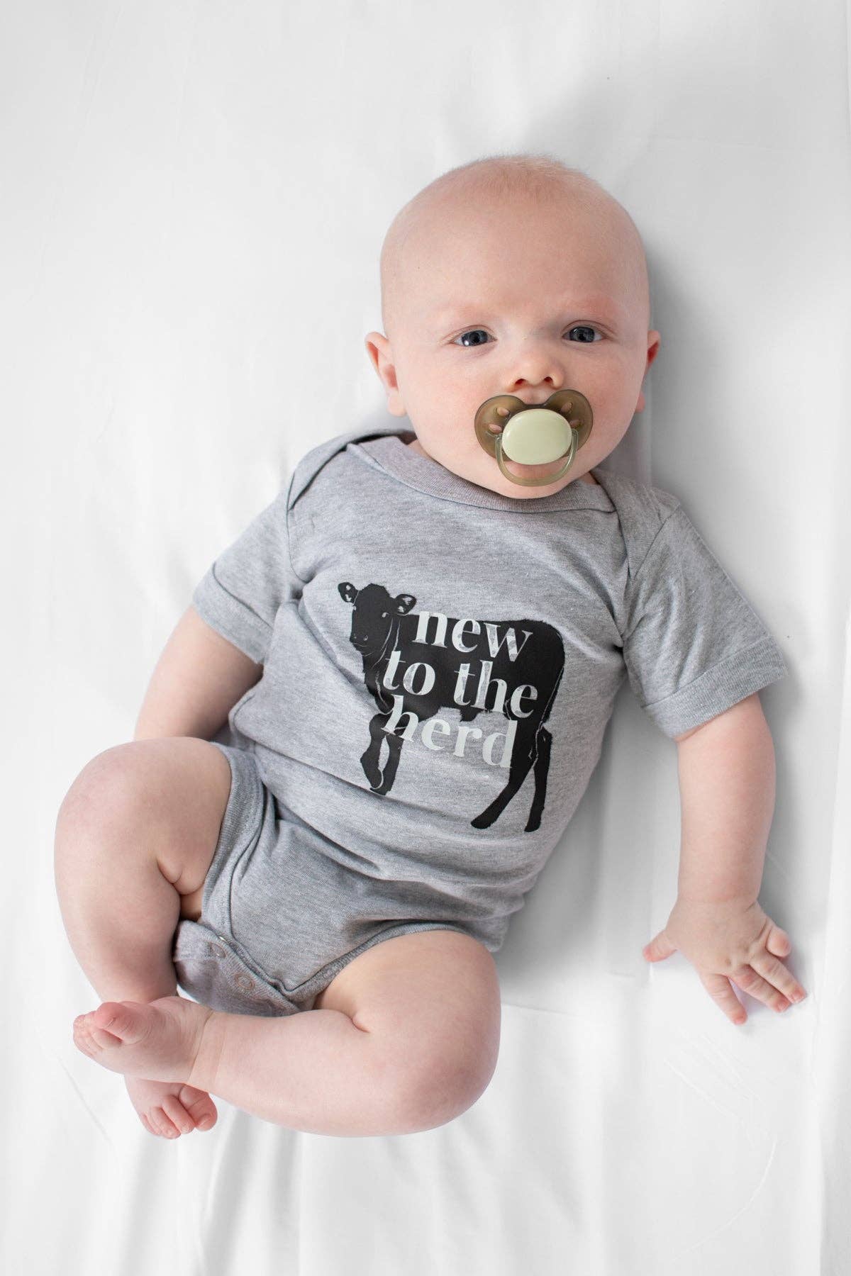 western 'new to the herd' baby onesie
