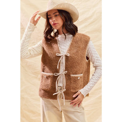 sherpa vest with stitch detail + front pockets