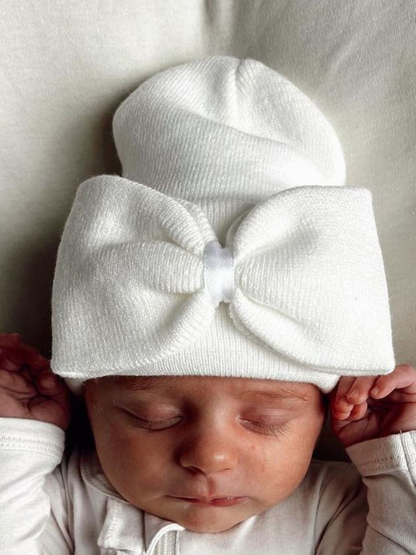 baby's first hat®, warm white bow