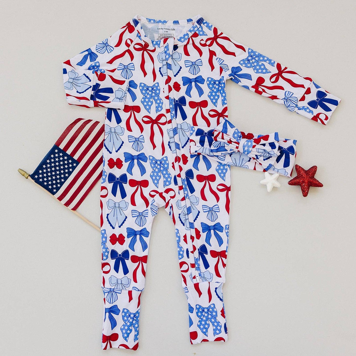 bamboo zip romper  | red-white + bows