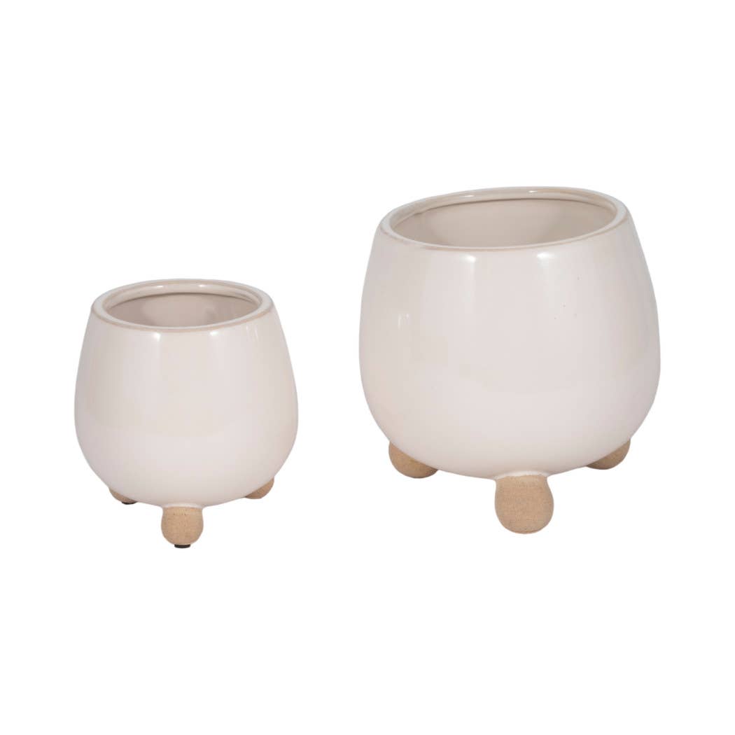 ivory round planter with knobby feet