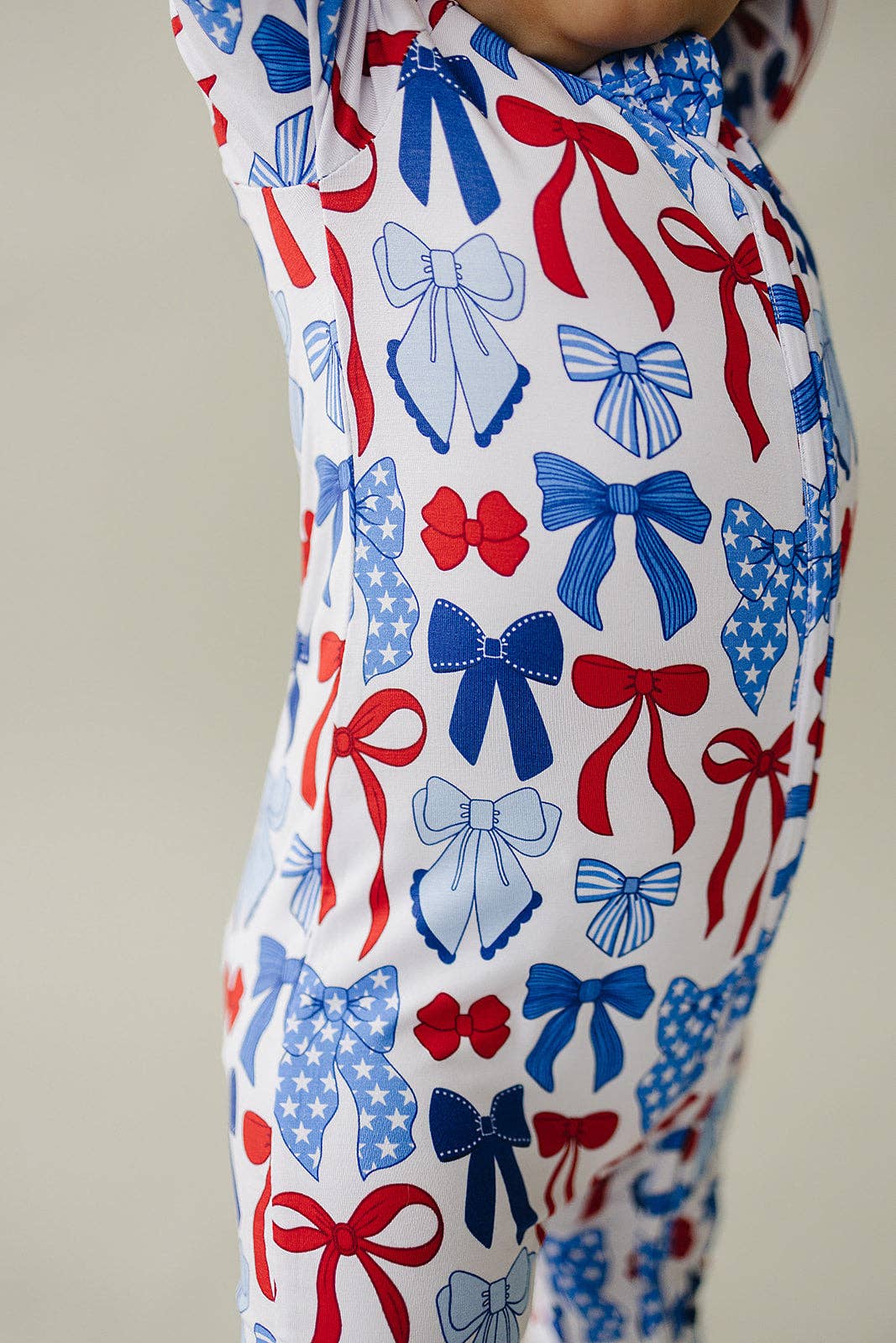 bamboo zip romper  | red-white + bows