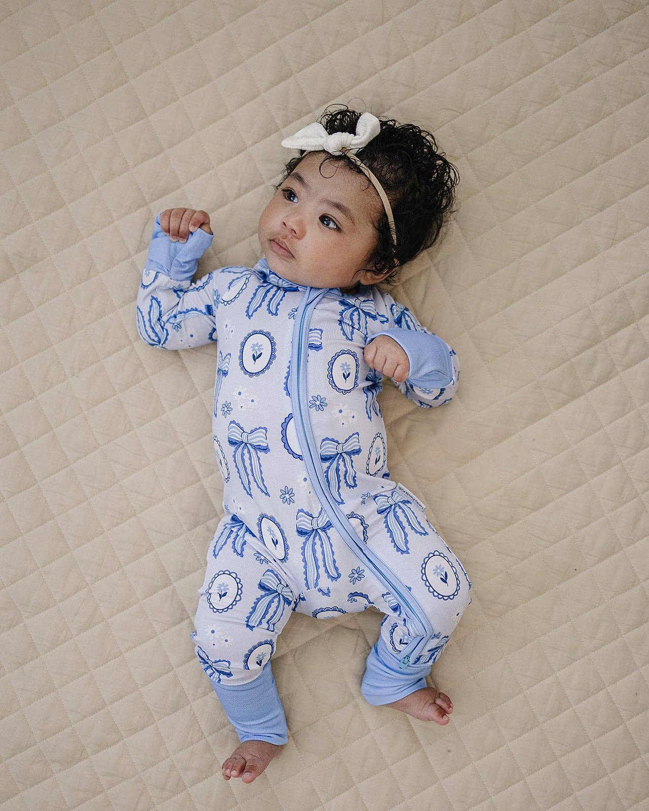 blue bow bamboo zip romper
