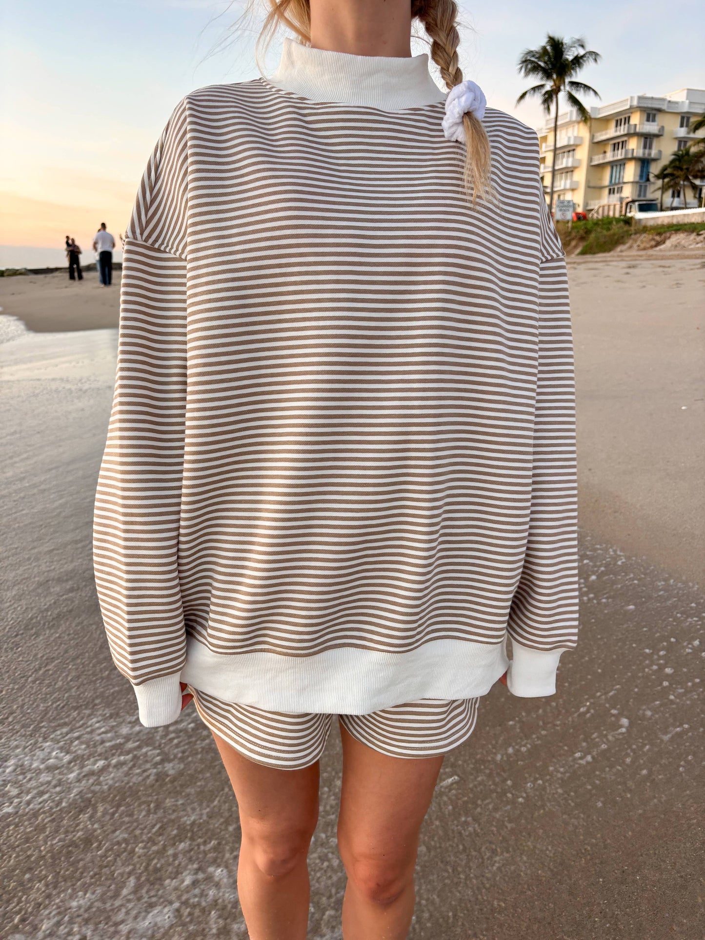 brown + white big striped mockneck sweatshirt