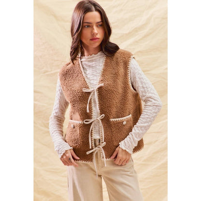 sherpa vest with stitch detail + front pockets