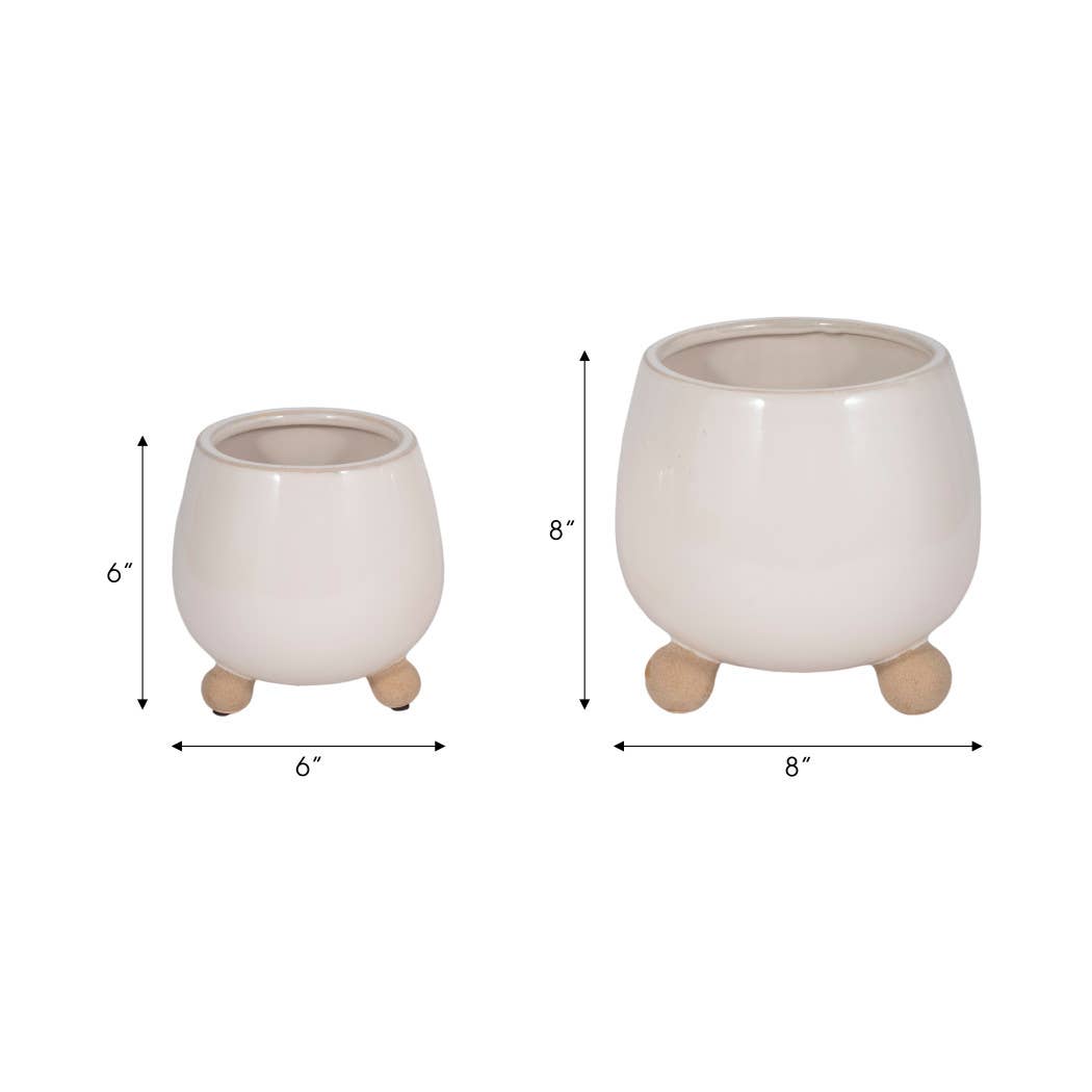 ivory round planter with knobby feet