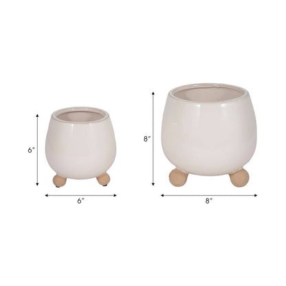 ivory round planter with knobby feet
