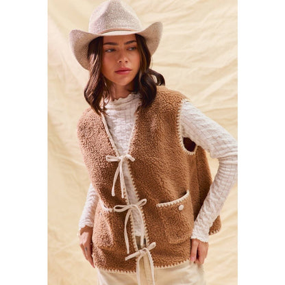 sherpa vest with stitch detail + front pockets