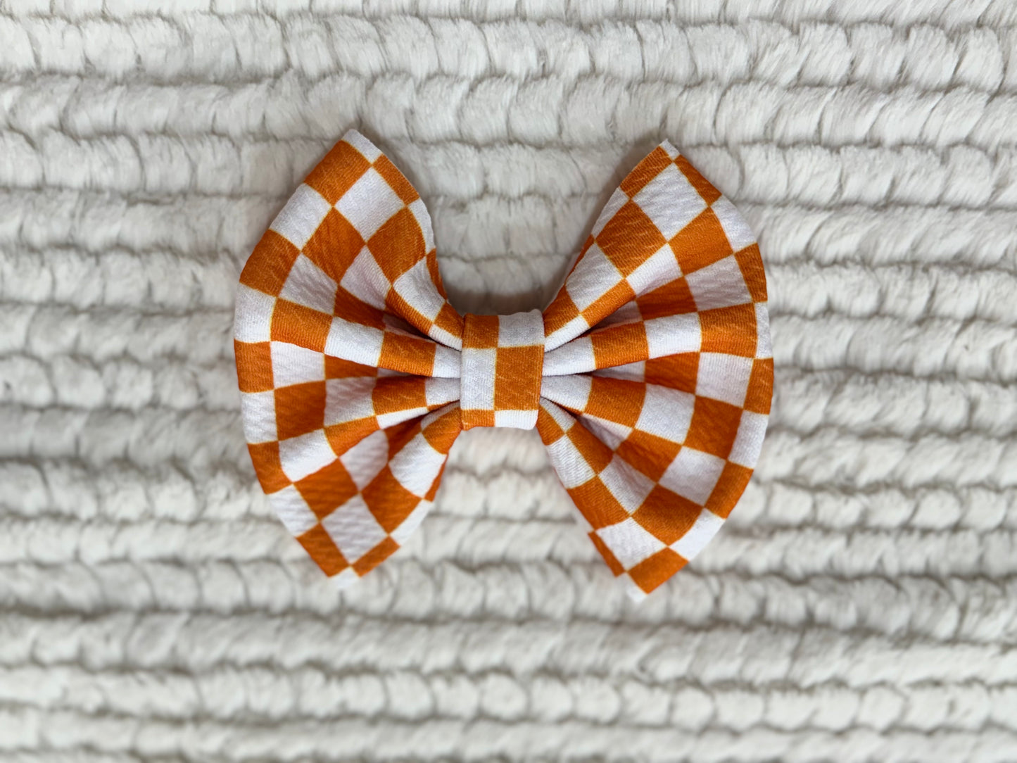 orange checkered bow