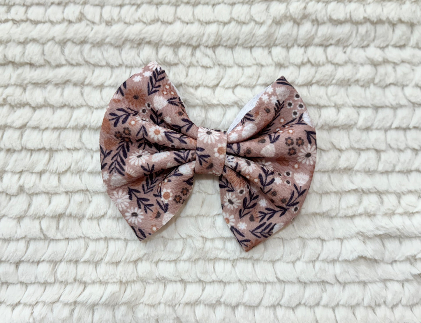 beige wildflowers bow