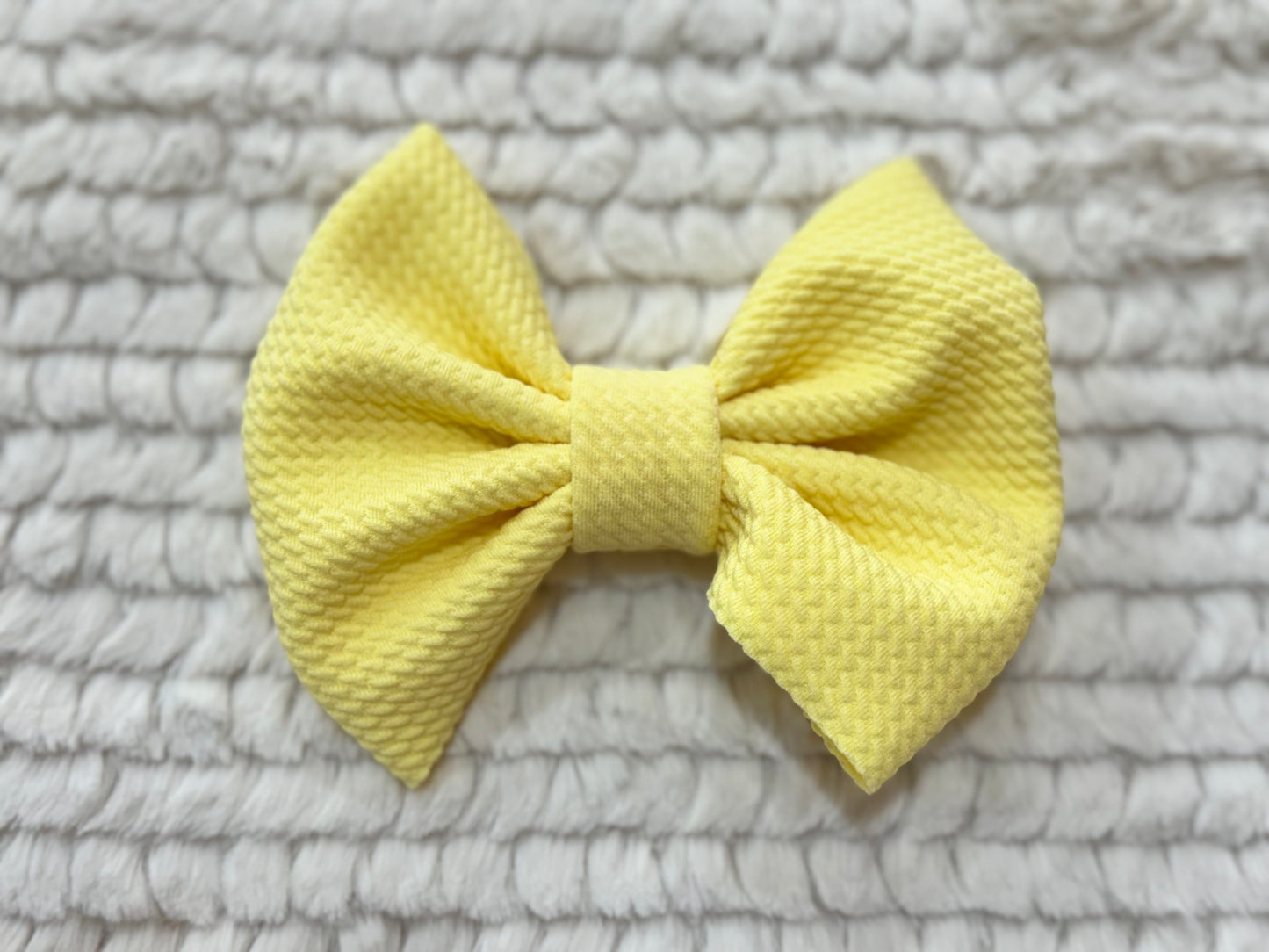 light yellow bow