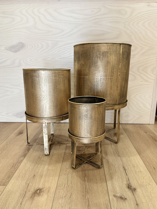 gold & black metal modern planters on stands