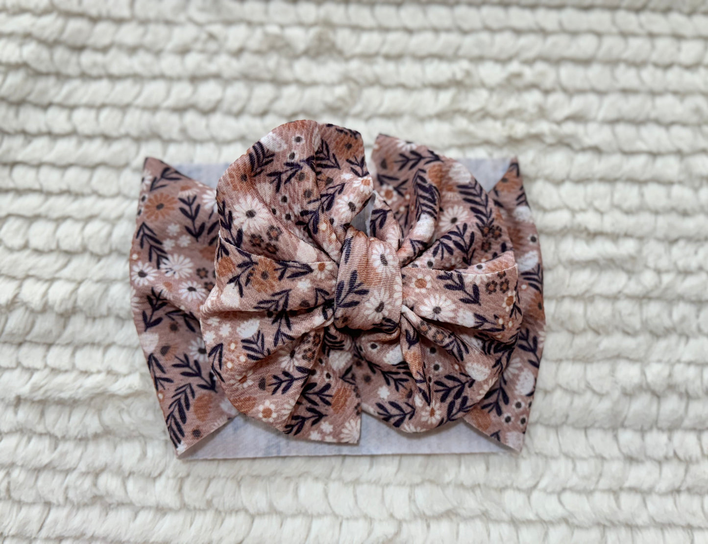 beige wildflowers bow