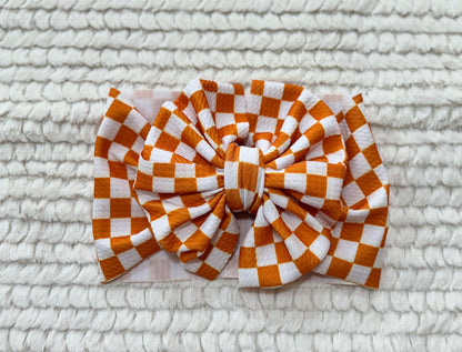 orange checkered bow