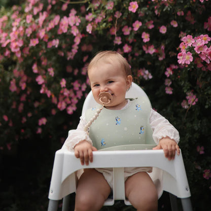 bluey x mushie silicone baby bib - sage