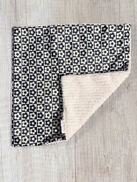 black + white daisy check lovey blanket