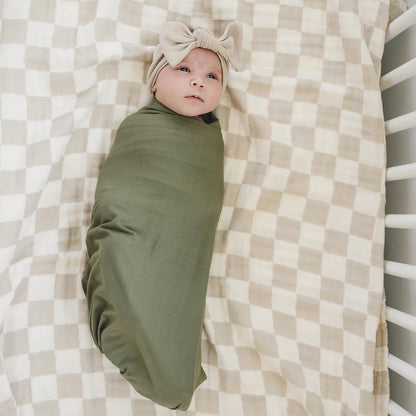 taupe checkered muslin quilt