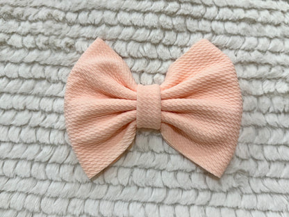 light peach bow