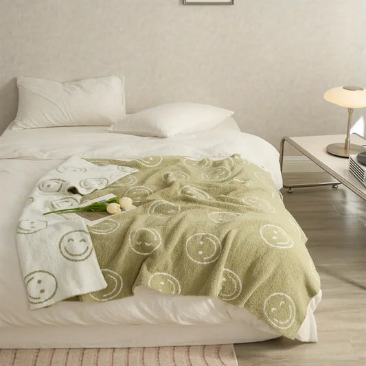 cozy happy face blanket • light green 27”x39”