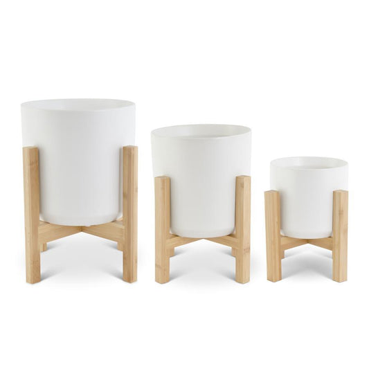 modern white ceramic pots + bamboo stands