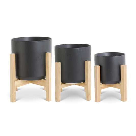 modern black ceramic pots + bamboo stands
