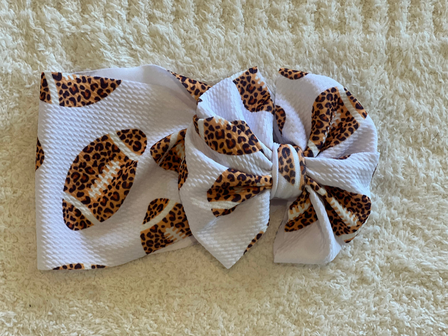 cheetah football bow