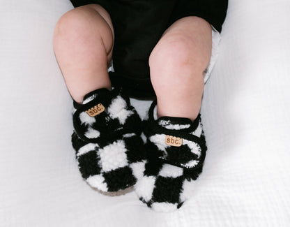 the newborn sherpa bootie — black + white checkered