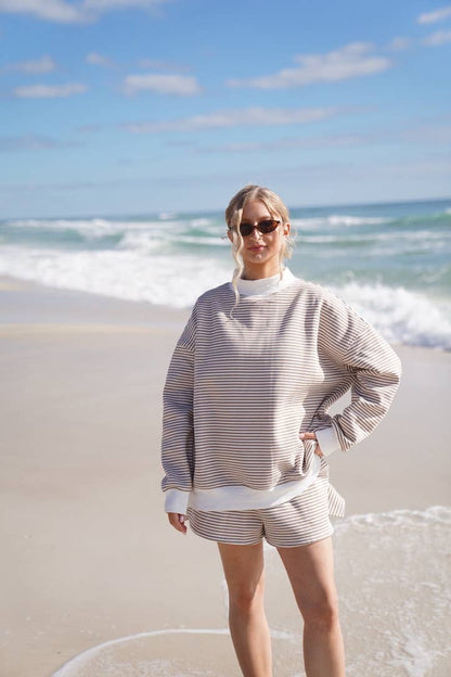 brown + white big striped mockneck sweatshirt