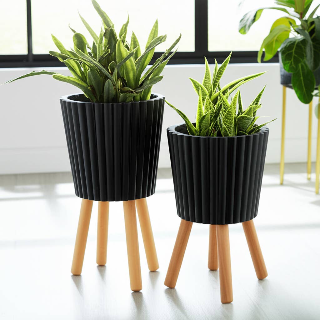 black resin w/ wood legs planter