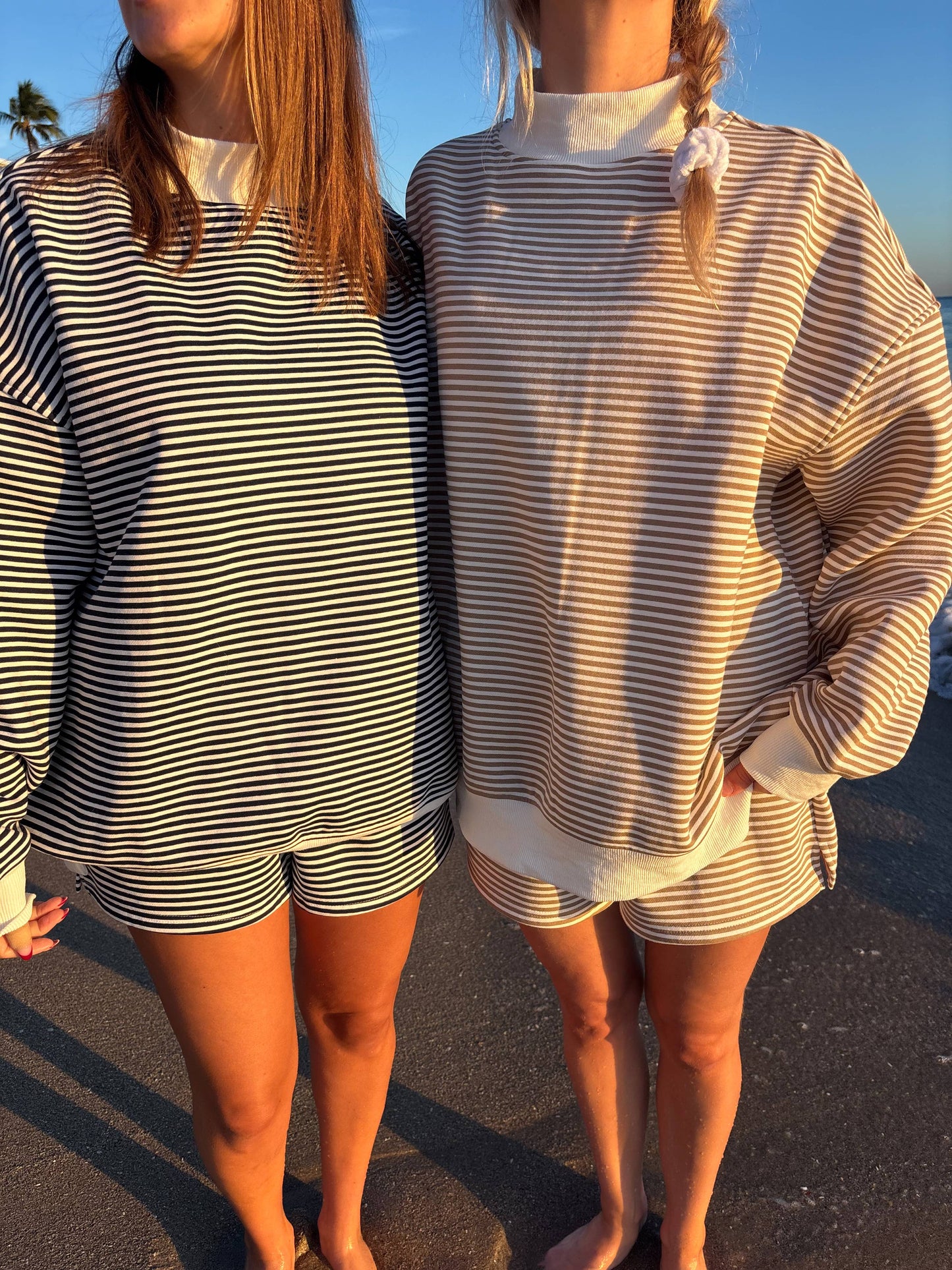 brown + white big striped mockneck sweatshirt