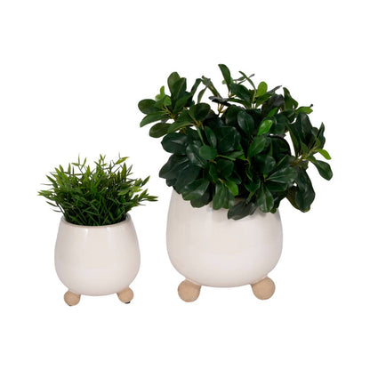 ivory round planter with knobby feet